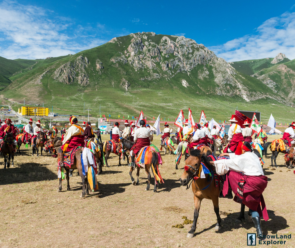 Horse back riders are about to entry the Horse Racing ground on Yushu Horse Festival