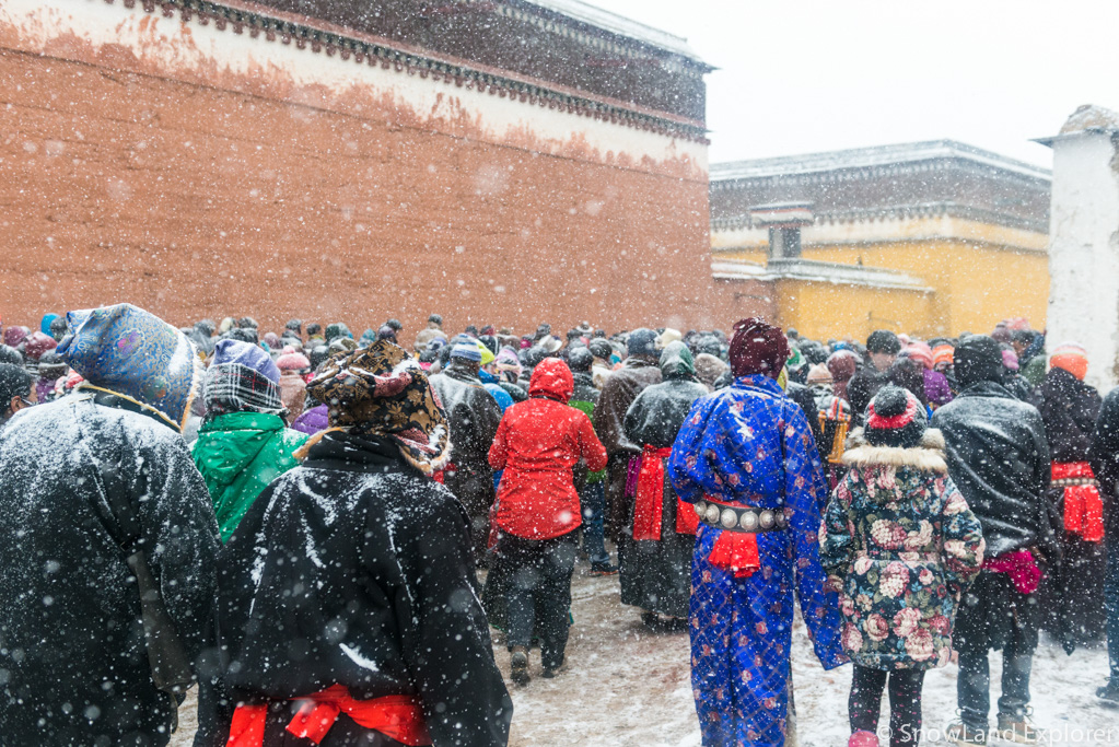 Tibetans following Buddha Maitreya doing Kora around Labrang Monastery