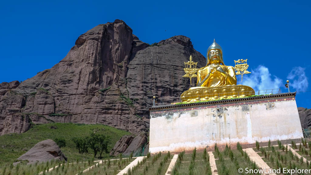 Je Tsongkhapa's statue in front of Mount Garuda in Ragya Monastery. 